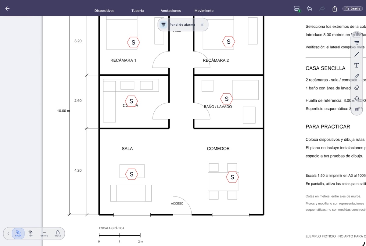 Captura real del editor de iPad con dispositivos colocados sobre una casa de práctica